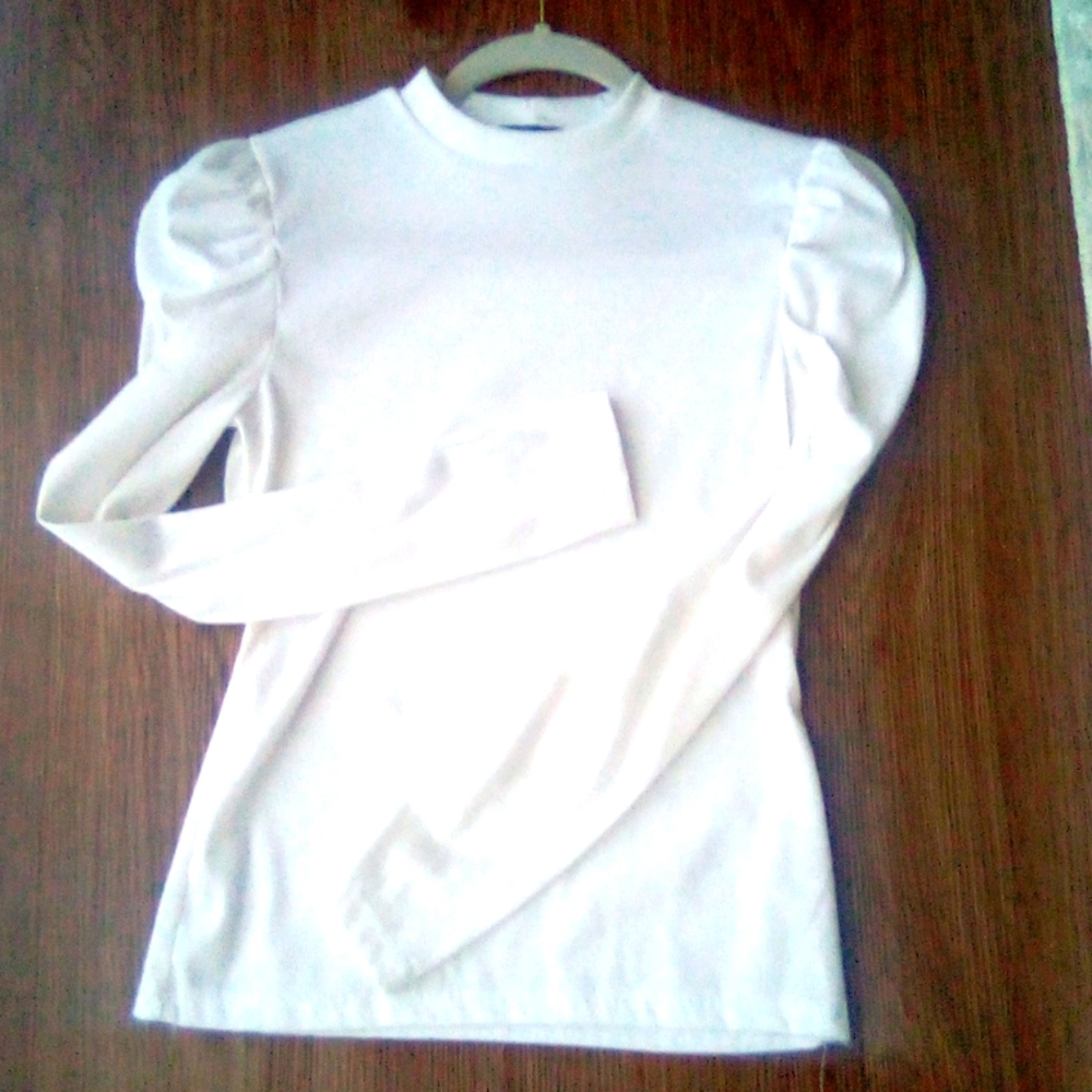 White long sleeve exaggerated shoulders